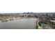 Expansive lake view showcasing park, tennis courts, and city skyline at 1733 Irving St # 101, Denver, CO 80204