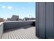 The rooftop deck offers great space for outdoor dining and relaxation at 1733 Irving St # 101, Denver, CO 80204