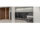 Finished basement featuring built-in shelving, carpet, and custom shutters at 5890 W Quarles Dr, Littleton, CO 80128