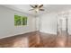 Spacious bedroom with hardwood floors, large window and ensuite bath at 5890 W Quarles Dr, Littleton, CO 80128