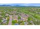 Gorgeous community aerial view highlighting the well-maintained homes, mature trees, and inviting streets at 10389 W Fair Ave # E, Littleton, CO 80127
