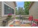 Inviting outdoor patio with colorful rug and seating, perfect for relaxing and enjoying the fresh air at 10389 W Fair Ave # E, Littleton, CO 80127