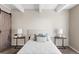 Bright bedroom showcases wood beam ceilings, decor, and warm neutral tones at 9725 E Harvard Ave # 434, Denver, CO 80231