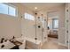 Bathroom showcasing a modern shower with glass enclosure and soaking tub at 14160 Bunny Hop Ln, Parker, CO 80134