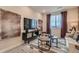 Inviting living room with stylish decor, comfortable seating, and a large window offering plenty of natural light at 14160 Bunny Hop Ln, Parker, CO 80134