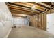 Unfinished basement featuring concrete floor and open ceiling, ready for customization at 4101 S Lincoln St, Englewood, CO 80113