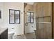 Modern bathroom featuring shower with glass door and contemporary finishes at 4101 S Lincoln St, Englewood, CO 80113