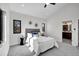 Bright bedroom with a ceiling fan, carpet, and a bright view from a modern window at 4101 S Lincoln St, Englewood, CO 80113