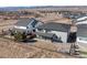 Charming home with covered patio and gravel landscaping blending seamlessly into a picturesque neighborhood setting at 455 Rogers Way, Castle Rock, CO 80104