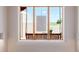 Window shows balcony with swing seat, offering a serene spot to enjoy the outdoor views at 1764 Mesa Ridge Ln, Castle Rock, CO 80108