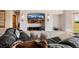 Cozy basement with a large screen TV perfect for entertainment at 1764 Mesa Ridge Ln, Castle Rock, CO 80108