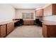 Bright office featuring built-in desks and cabinetry at 1764 Mesa Ridge Ln, Castle Rock, CO 80108