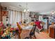 Bright dining room featuring wood floors and lots of natural light at 12458 E Kansas Pl, Aurora, CO 80012