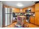 Efficient kitchen equipped with stainless steel appliances and ample storage at 12458 E Kansas Pl, Aurora, CO 80012