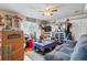Cozy living room with ceiling fan at 12458 E Kansas Pl, Aurora, CO 80012