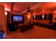 Finished basement with a home theater, a projector and a stage with sound dampening panels at 15857 E Aberdeen Ave, Centennial, CO 80016