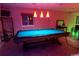 Game room featuring a blue billiard table with pendant lights above for enjoyable leisure at 15857 E Aberdeen Ave, Centennial, CO 80016