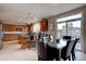 Spacious kitchen with stainless appliances, granite counters, and a large island at 15857 E Aberdeen Ave, Centennial, CO 80016