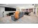 Finished basement featuring a lounge area, pool table, and stylish decor at 12518 W 77Th Pl, Arvada, CO 80005