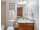 Bright bathroom with granite countertop and stylish fixtures at 12518 W 77Th Pl, Arvada, CO 80005