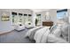 Bright bedroom featuring ample windows and sitting area at 12518 W 77Th Pl, Arvada, CO 80005