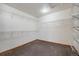 Spacious walk-in closet with ample shelving for storage at 12518 W 77Th Pl, Arvada, CO 80005