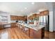 Gourmet kitchen with granite countertops and stainless steel appliances at 12518 W 77Th Pl, Arvada, CO 80005
