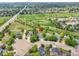 Aerial view of the home situated in a well maintained neighborhood with a golf course at 2205 Santa Fe Dr, Longmont, CO 80504