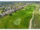 Overhead view of a golf course bordering a beautiful neighborhood at 2205 Santa Fe Dr, Longmont, CO 80504