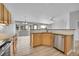 Well-lit kitchen boasts granite counters, stainless steel appliances, and an open floor plan at 2205 Santa Fe Dr, Longmont, CO 80504