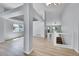 Bright living space with wood floors, an open floor plan, and modern lighting at 2205 Santa Fe Dr, Longmont, CO 80504