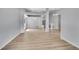 Expansive living room featuring wood floors, neutral walls, and an open layout perfect for entertaining at 2205 Santa Fe Dr, Longmont, CO 80504