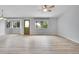 Bright living room featuring hardwood floors, neutral walls, and a large bay window at 2205 Santa Fe Dr, Longmont, CO 80504