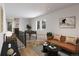 Upstairs living area featuring a game table, stylish decor, and comfortable seating at 4201 Wyandot St, Denver, CO 80211
