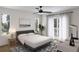 Bright bedroom with a ceiling fan, large windows, and access to a balcony at 4201 Wyandot St, Denver, CO 80211