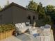 Outdoor patio space furnished with a cozy couch and chairs, perfect for relaxing at 4201 Wyandot St, Denver, CO 80211
