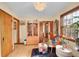 Cozy living room featuring hardwood floors and eclectic furniture, filled with natural light at 3070 Colorado Blvd, Denver, CO 80207