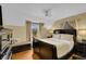 Spacious main bedroom featuring hardwood floors, neutral walls, and bright, natural light at 3070 Colorado Blvd, Denver, CO 80207