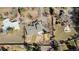 Birds eye view of the property with a large lot, playground, adjacent homes, and mature landscaping at 7400 W Quincy Ave, Littleton, CO 80123