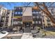 Charming condominium complex featuring a well-maintained facade and inviting entrance at 7040 E Girard Ave # 104, Denver, CO 80224