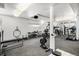 Well-equipped gym space with weight machines, free weights, and mirrored walls at 7040 E Girard Ave # 104, Denver, CO 80224