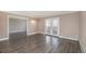 Open living room featuring doors to patio at 7040 E Girard Ave # 104, Denver, CO 80224