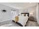 Bedroom with soft carpet, neutral colors, with a window bringing in lots of light at 7100 E 5Th Ave, Denver, CO 80220