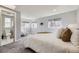 Spacious main bedroom with ensuite bathroom at 7100 E 5Th Ave, Denver, CO 80220