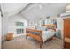 Charming main bedroom with vaulted ceiling, accent wall, and natural light at 2490 S Worchester Ct # E, Aurora, CO 80014