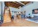 Inviting living room with open floor plan, staircase, modern kitchen, and abundant natural light at 2715 Blake St # 2, Denver, CO 80205
