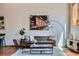 Relaxing living room space offering modern furnishings and decor with accent wall art at 2715 Blake St # 2, Denver, CO 80205