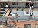 Aerial view of the rooftop deck with outdoor seating and artificial turf at 2715 Blake St # 2, Denver, CO 80205