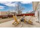 Backyard patio with comfortable seating and a fire pit, perfect for outdoor relaxation at 6426 Zang Ct, Arvada, CO 80004