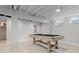 Finished basement offering versatile space with a pool table and access to other areas at 6426 Zang Ct, Arvada, CO 80004